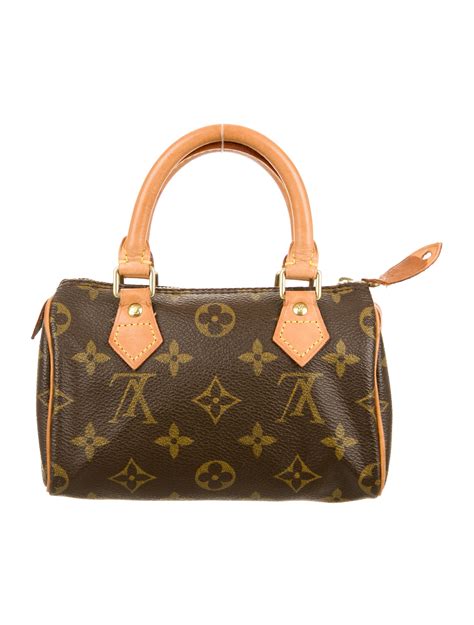 louis vuitton mini monogram speedy bag charm|Speedy Monogram Bag Charm S00 .